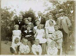 My grandmother Asta no. two from right in the back and all her cousins. Ellen is sitting on the lap of her older sister Julie in the middle. picture from about 1906
