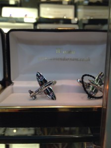 Cuff link as small Spitfire planes