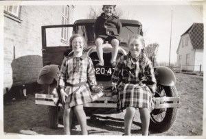 A rare visit by a car, my mother is on the left 1930