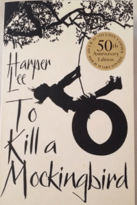 The book cover on "To Kill a Mockingbird"