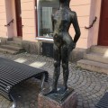 A statue of girl in the cobbled street in&nbsp;Eksjö
