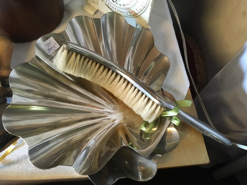 a dustpan and a brush for the table