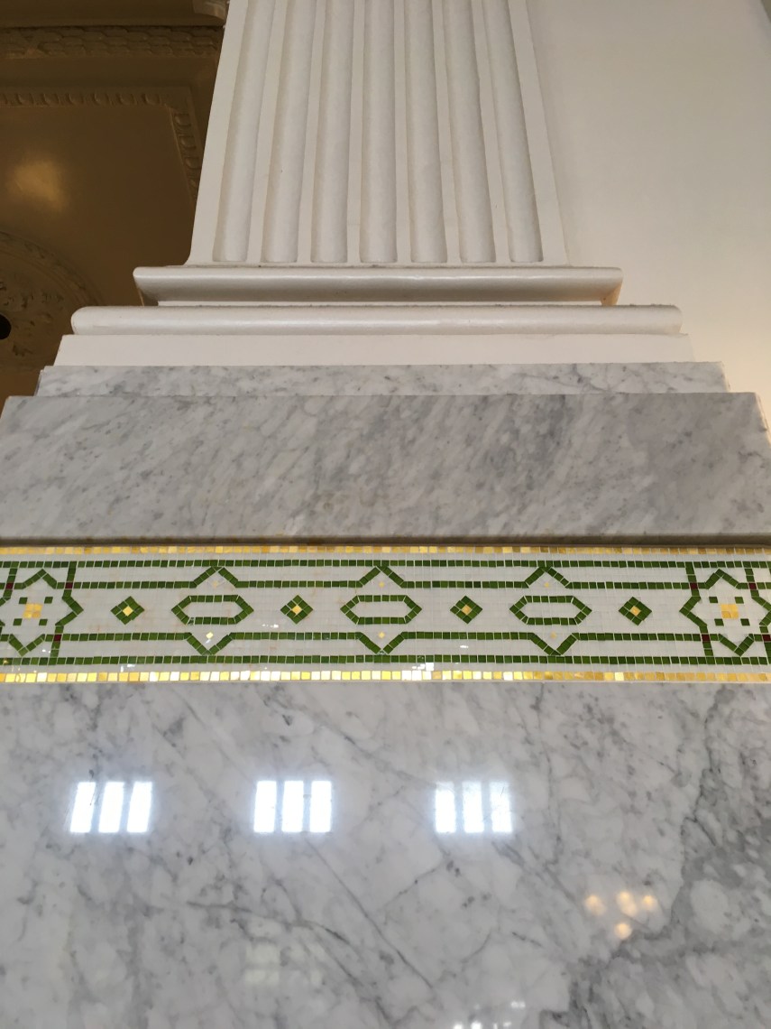 Detail of a column and the mosaic  decoration underneath