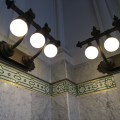Lamps and the mosaic  decoration underneath at King Street&nbsp;Station