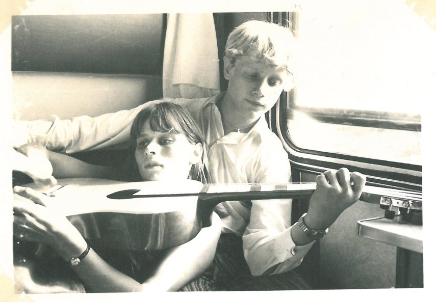 Two of my classmates playing the guitar together on the long train ride to Prague