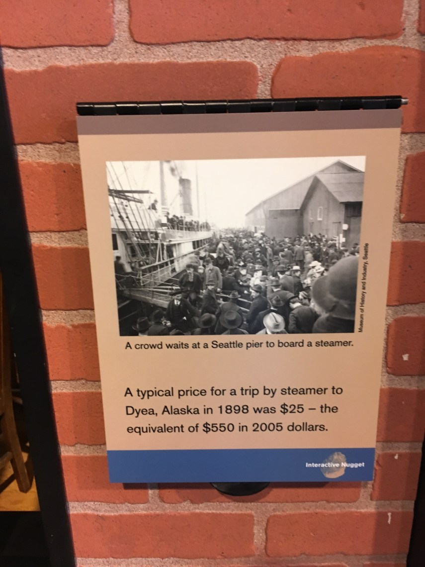 A crowd waiting to board a steamer