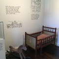 A corner of the children’s room at the priest house with historical and biblical teachings on the&nbsp;wall