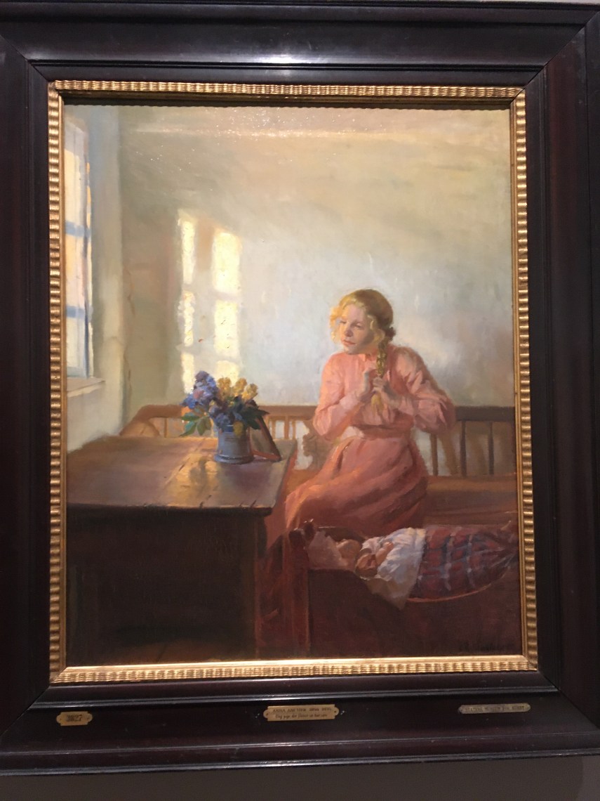 Interior with a young woman braiding her hair 1901 by Anna Ancher (1859-1935)